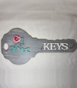 colgador de llaves gris